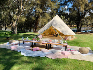 Picnic outside glamping tent